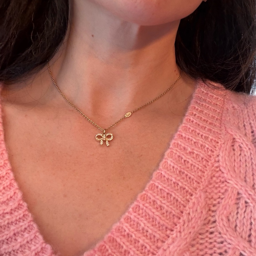 Coach Gold-Tone Crystal Bow Necklace with Legacy Striped Pouch and Coach Logo - Picture 7 of 7